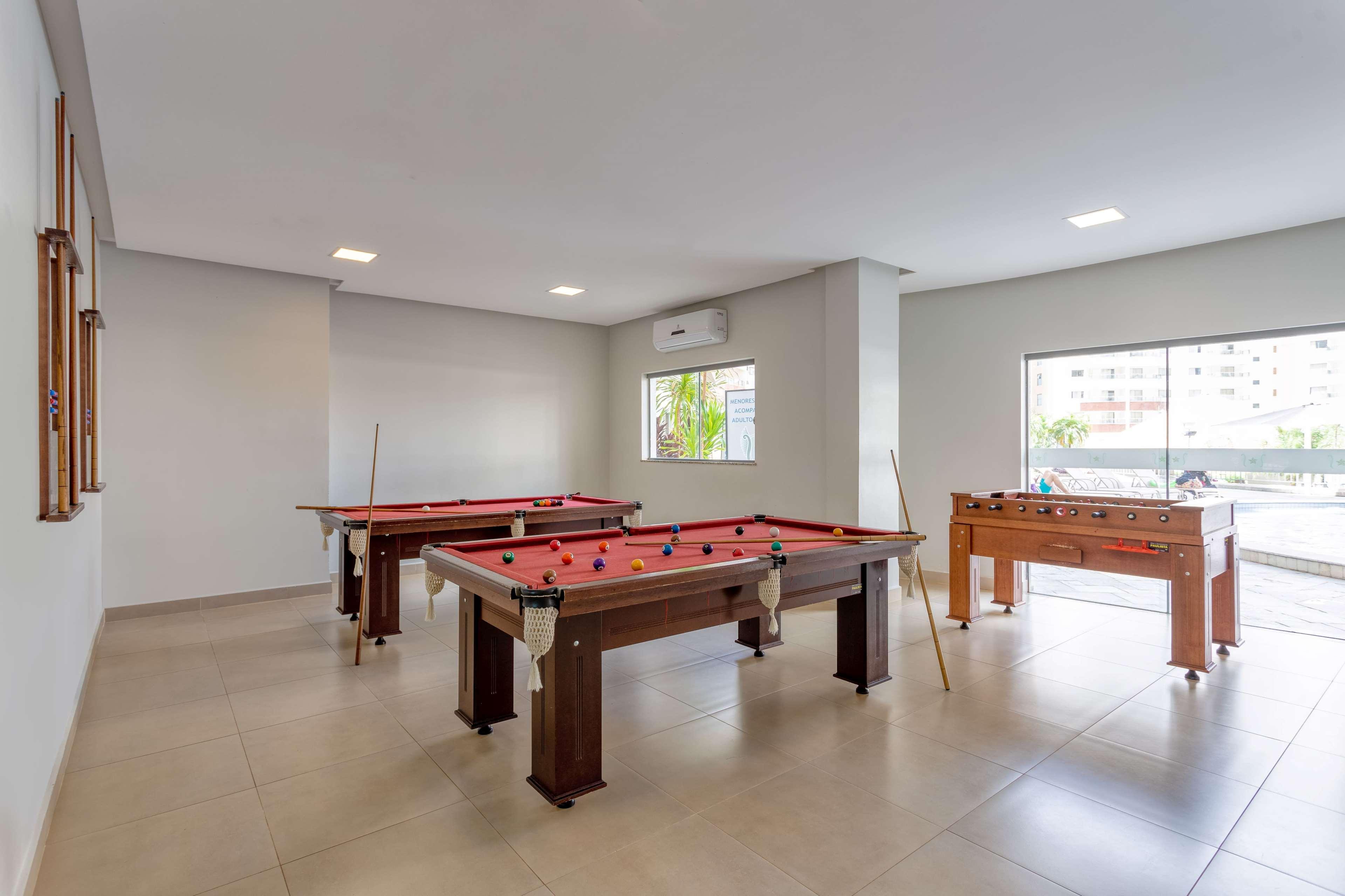 Wyndham Olimpia Royal Hotels Buitenkant foto A pool table and a foosball table